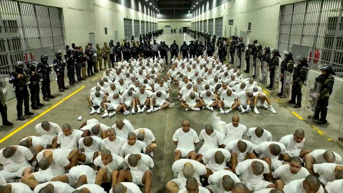 A screengrab from a video obtained from the El Salvador Presidential Press Office shows alleged members of the Venezuelan criminal organization Tren de Aragua, deported by the U.S. government, detained at the Terrorism Confinement Center in Tecoluca, El Salvador, on March 16, 2025.