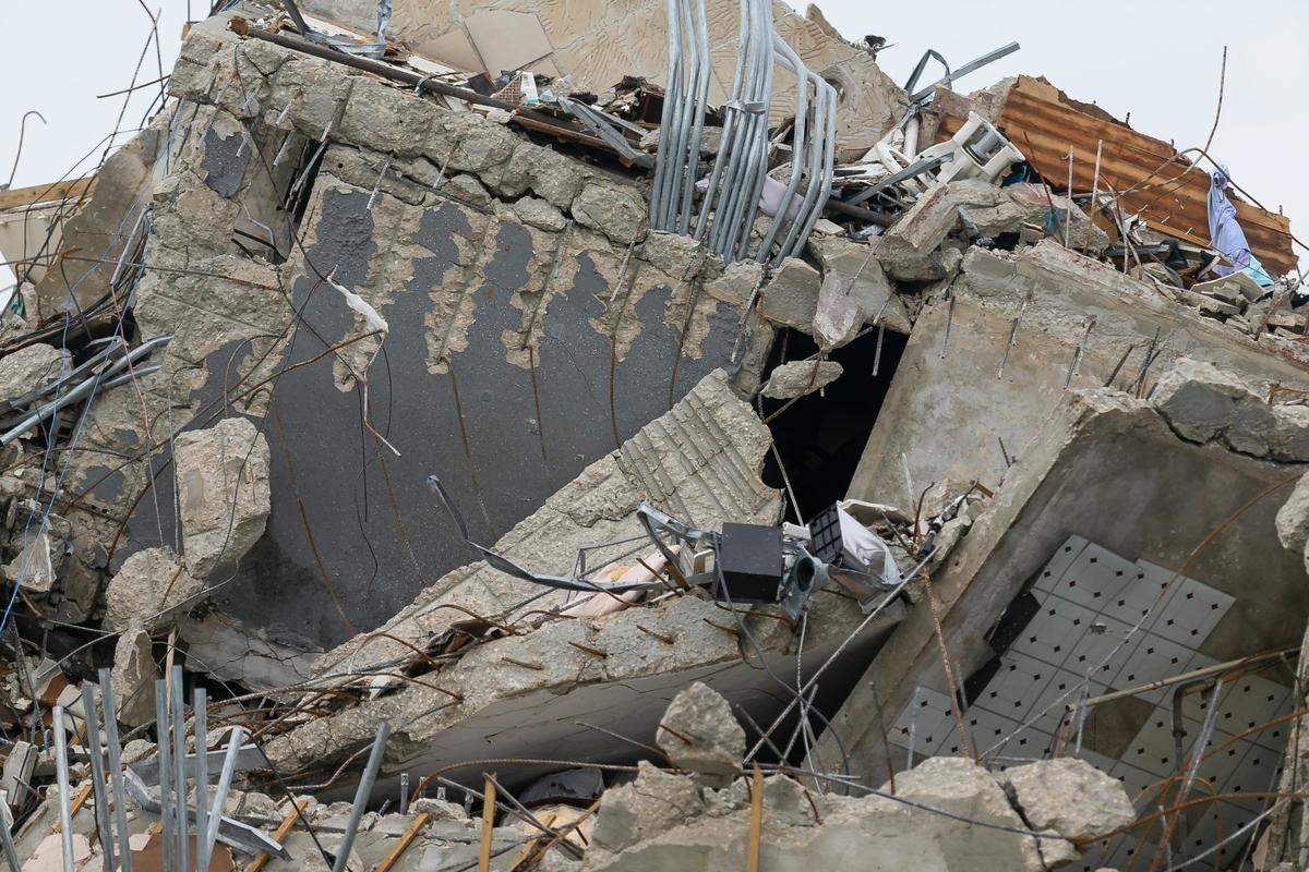 Rubble and debris of the Champlain Towers South condo can be seen in Surfside, Florida, on Tuesday, July 6, 2021. The rubble shown here is from the front portion of the condo building, which was demolished on July 4 after the back part of the tower collapsed with people inside on June 24.