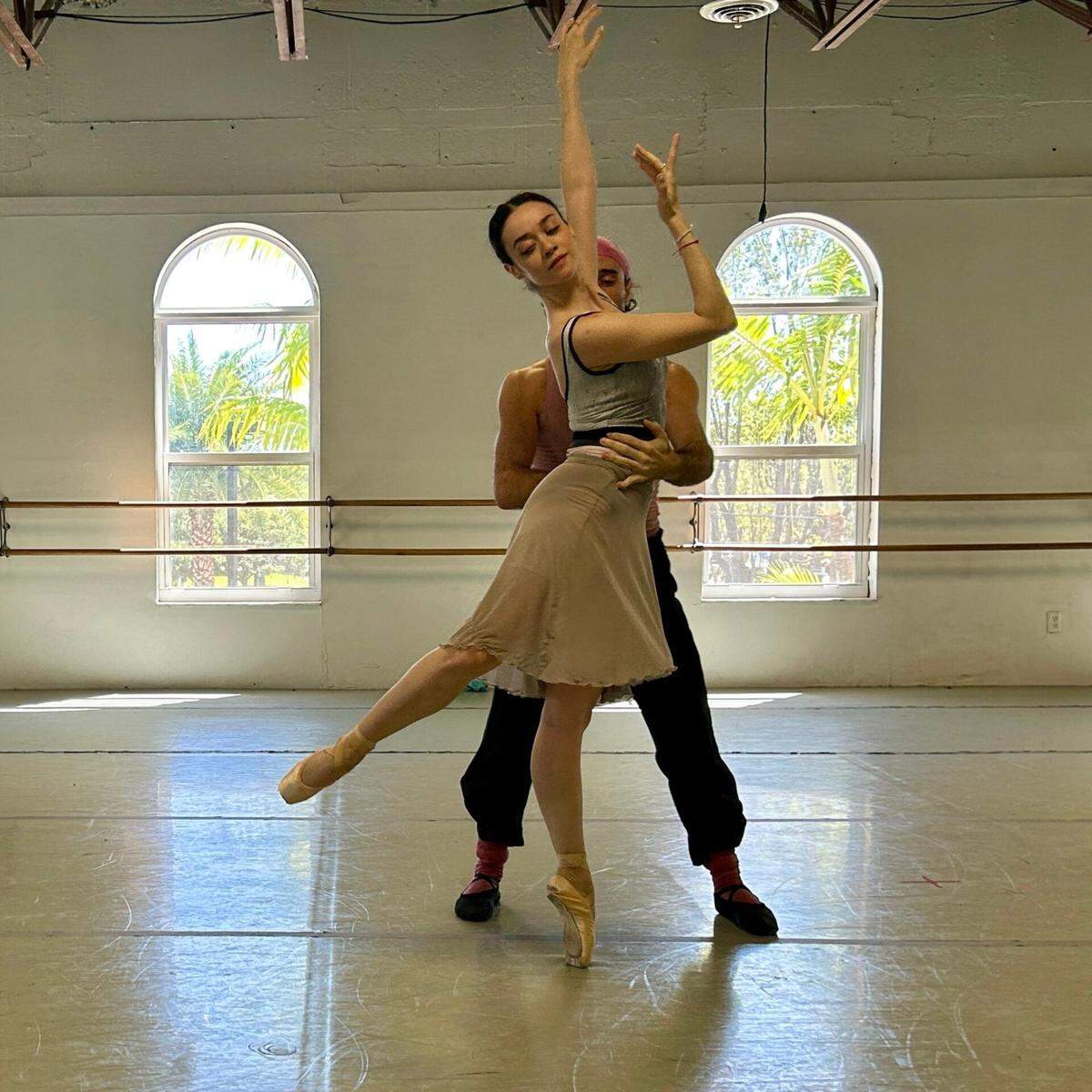 Dimensions Dance Theatre’s Jessica Arechavaleta and Ariel Morilla rehearse “Valley of Shadows,” choreography by Selah Jane Oliver.