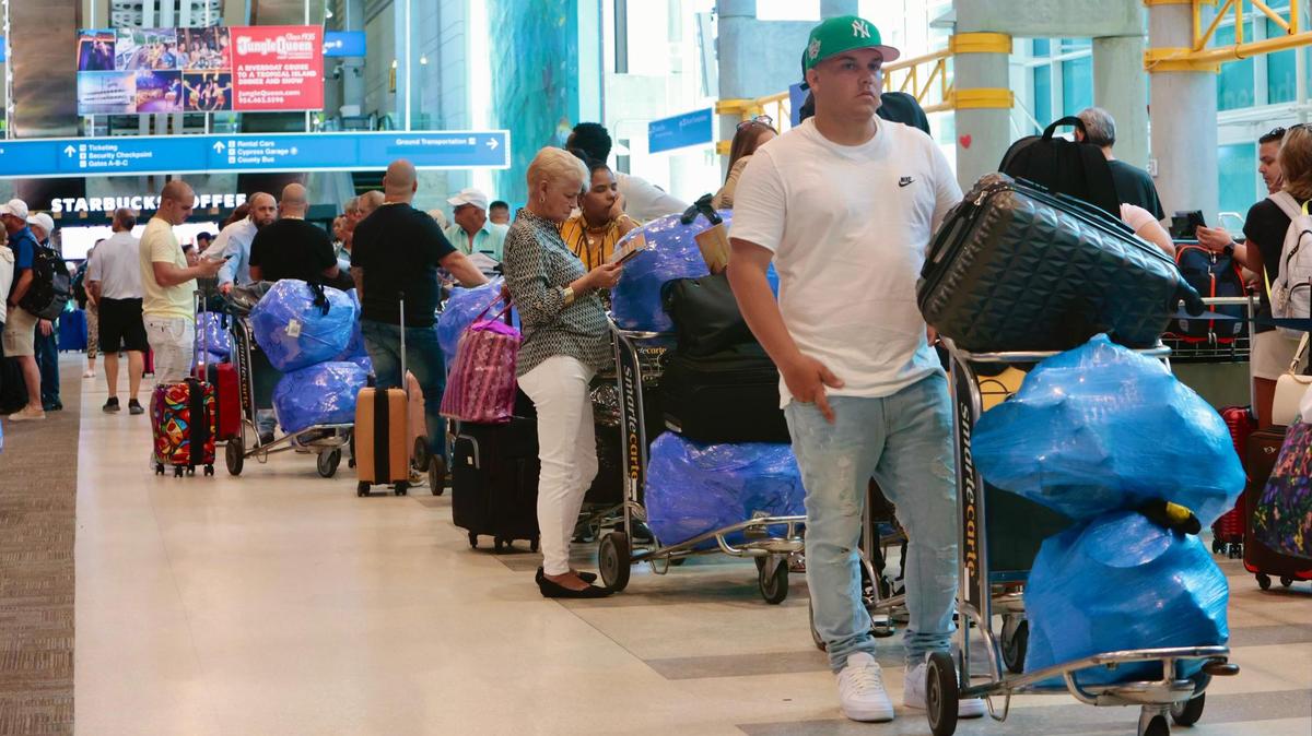 Passengers line up for boarding passes for flights on Southwest Airlines at Fort Lauderdale-Hollywood International Airport on Friday, April 14, 2023.