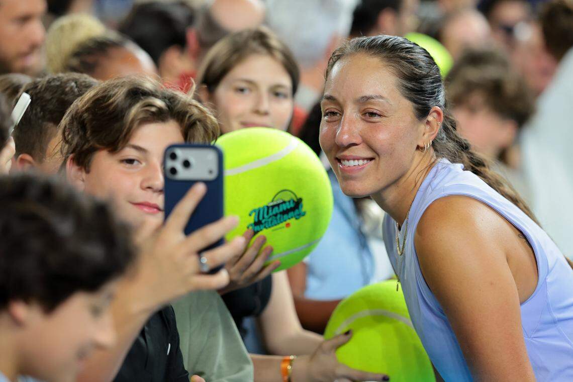 Jessica Pegula takes a selfie with a young fan after her exhibition match at the Miami Tennis Invitational on Monday, Dec. 8, 2025, at loanDepot Park in Miami, Fla.