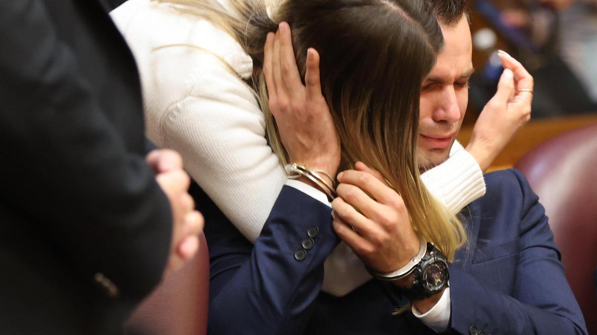 Former Hialeah police officer Rafael Otano, seen here embracing his wife Damaris after a jury found him guilty of armed-kidnapping in August, was sentenced to 5 1/2 years in prison on Wednesday, Nov. 1, 2023.