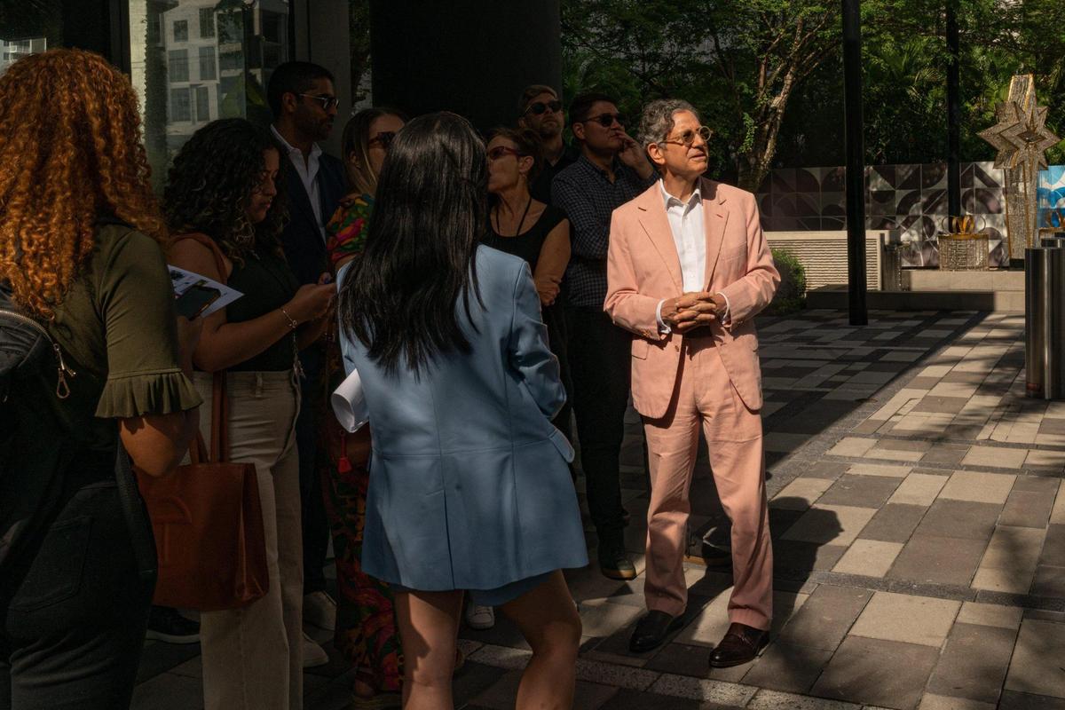 Curator Jeffrey Deitch gives a tour of the public art at Miami Worldcenter.