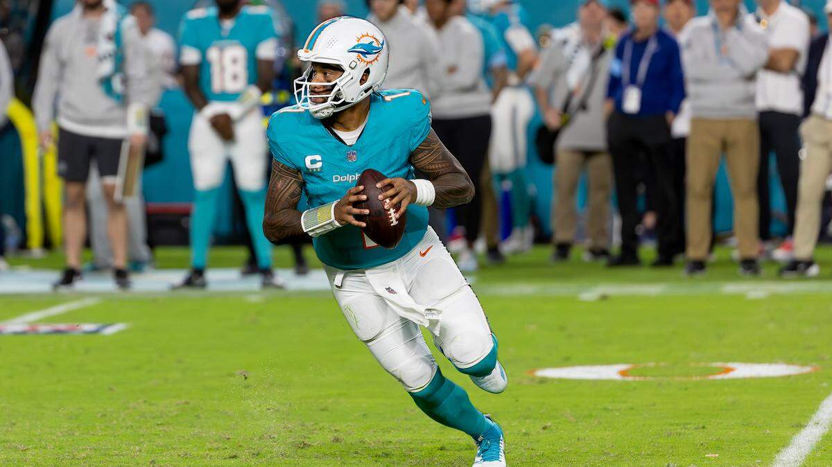 Miami Dolphins quarterback Tua Tagovailoa (1) prepares to pass during the second half of their NFL game against the San Francisco 49ers at Hard Rock Stadium on Sunday, Dec. 22, 2024, in Miami Gardens, Florida.