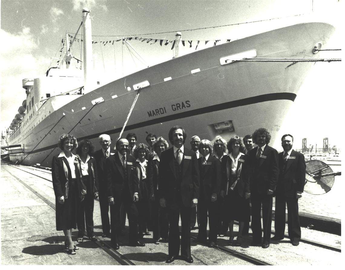 Carnival staff in front of the original Mardi Gras ship in 1972.
