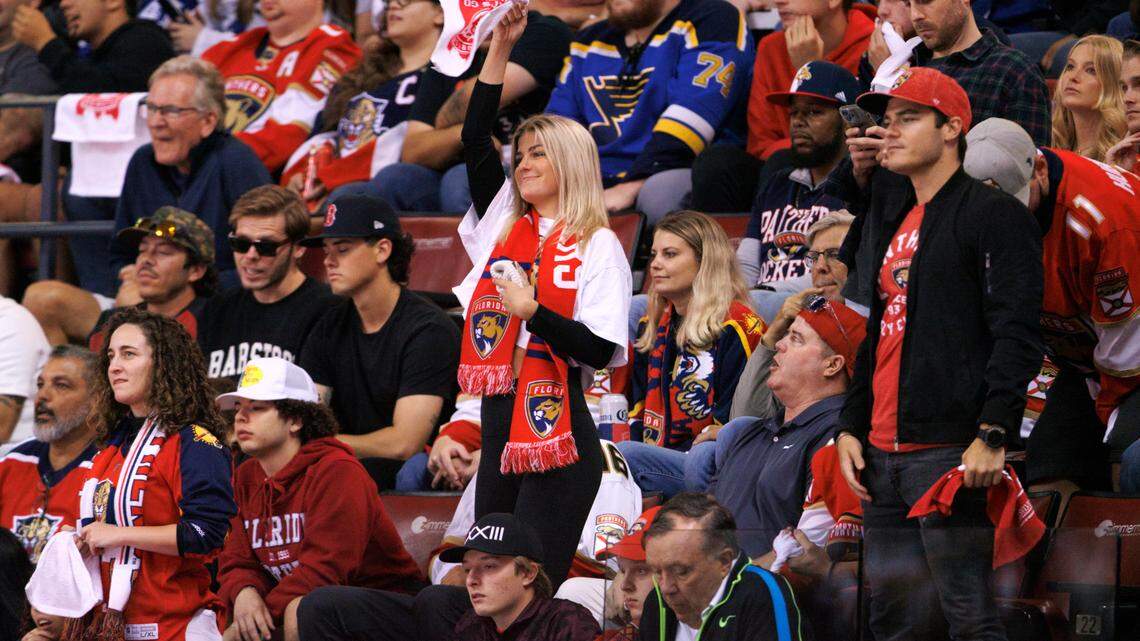 Hockey fans showing their support to their teams during the second period of Game 2 of a second round NHL Stanley Cup series between the Florida Panthers against the Tampa Bay Lightning at FLA Live Arena on Thursday, May 19, 2022 in Sunrise, Fl.