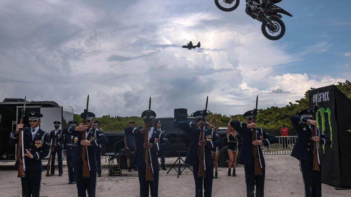 On Sunday, May 29, 2022 motorcycle acrobatics meet with military precision in South Beach Sunday, as an Air Force honor guard performed drills on the sand as professional motorcross drivers jump their bikes across 70 feet between ramps on the sand.
