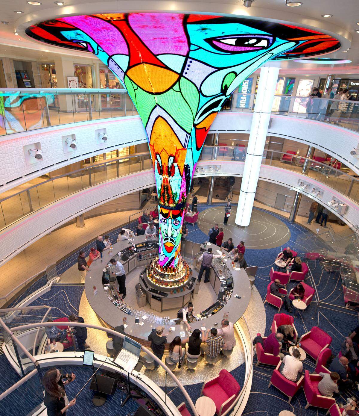 Carnival Horizon’s main atrium is highlighted by the Dreamscapes LED sculpture that is three decks high.