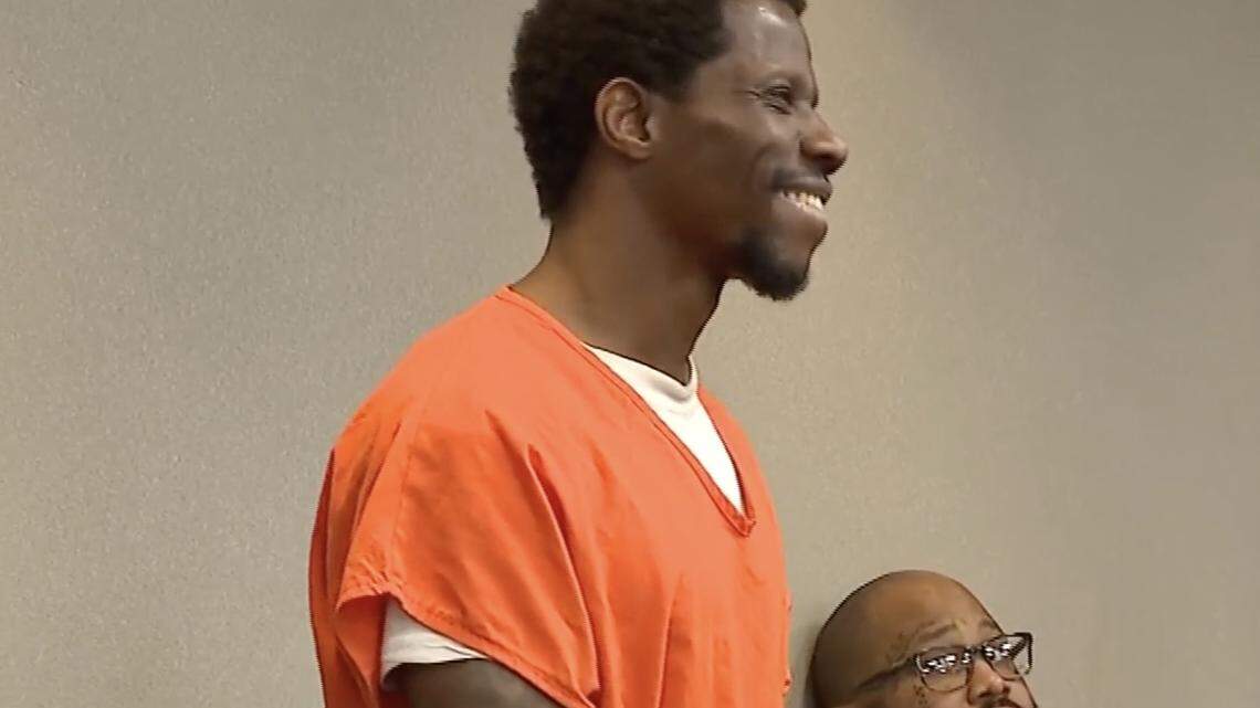 Marcus Terry smiles in court as a judge sentences him to life on Tuesday, April 21, 2026.