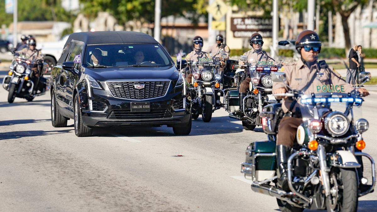Funeral procession for Deputy Devin M. Jaramillo to Loan Depot Park following mass at St. Michael The Archangel Catholic Church in Miami, Florida, on Tuesday, November 18, 2025.  Deputy Devin M. Jaramillo, died on the line of duty November 7 after being shot in southwest Miami-Dade County. 