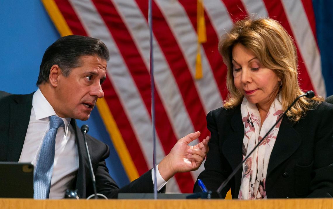 Miami-Dade Public Schools Superintendent Alberto Carvalho talks with Dr. Marta Pérez during a special meeting of the School Board on Tuesday, Jan. 18, 2022. The meeting concluded with the board narrowing the field to three finalists to be the next school superintendent. The board is meeting at 2 p.m. Monday to interview the candidates and vote on whom to hire.