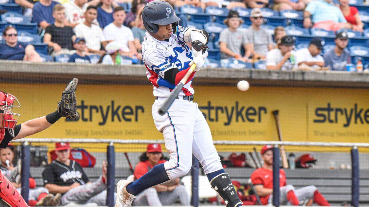 Outfielder Victor Victor Mesa swings at a pitch on Saturday, July 16, 2022, while playing for the Pensacola Blue Wahoos.