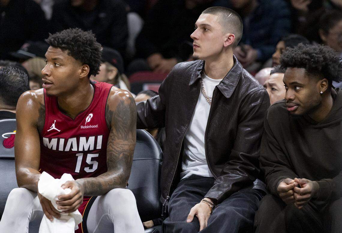 Miami Heat guard Tyler Herro (14) watches his teammates play against the Chicago Bulls in the first half of their NBA game at Kaseya Center on Jan. 31, 2026, in Miami.