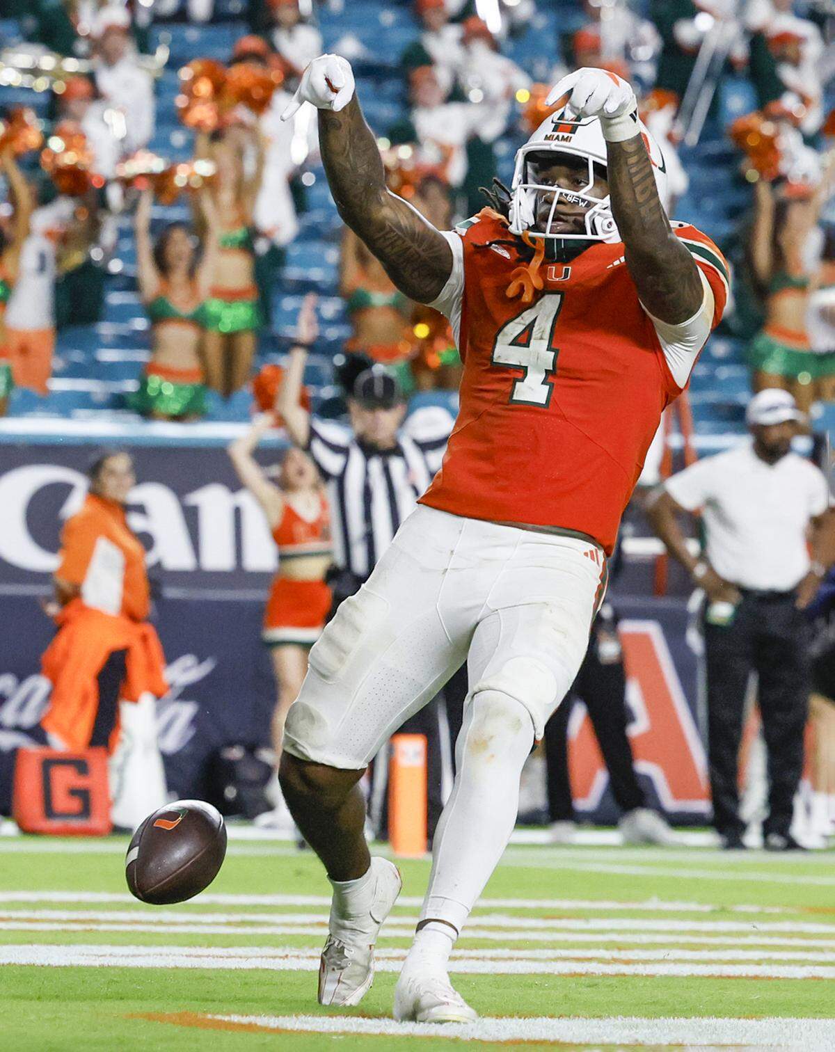 Miami Hurricanes running back Mark Fletcher Jr. (4) reacts as he scores in the second half against the South Florida Bulls during their NCAA football game at Hard Rock Stadium in Miami Gardens, Florida, on Saturday, September 13, 2025.