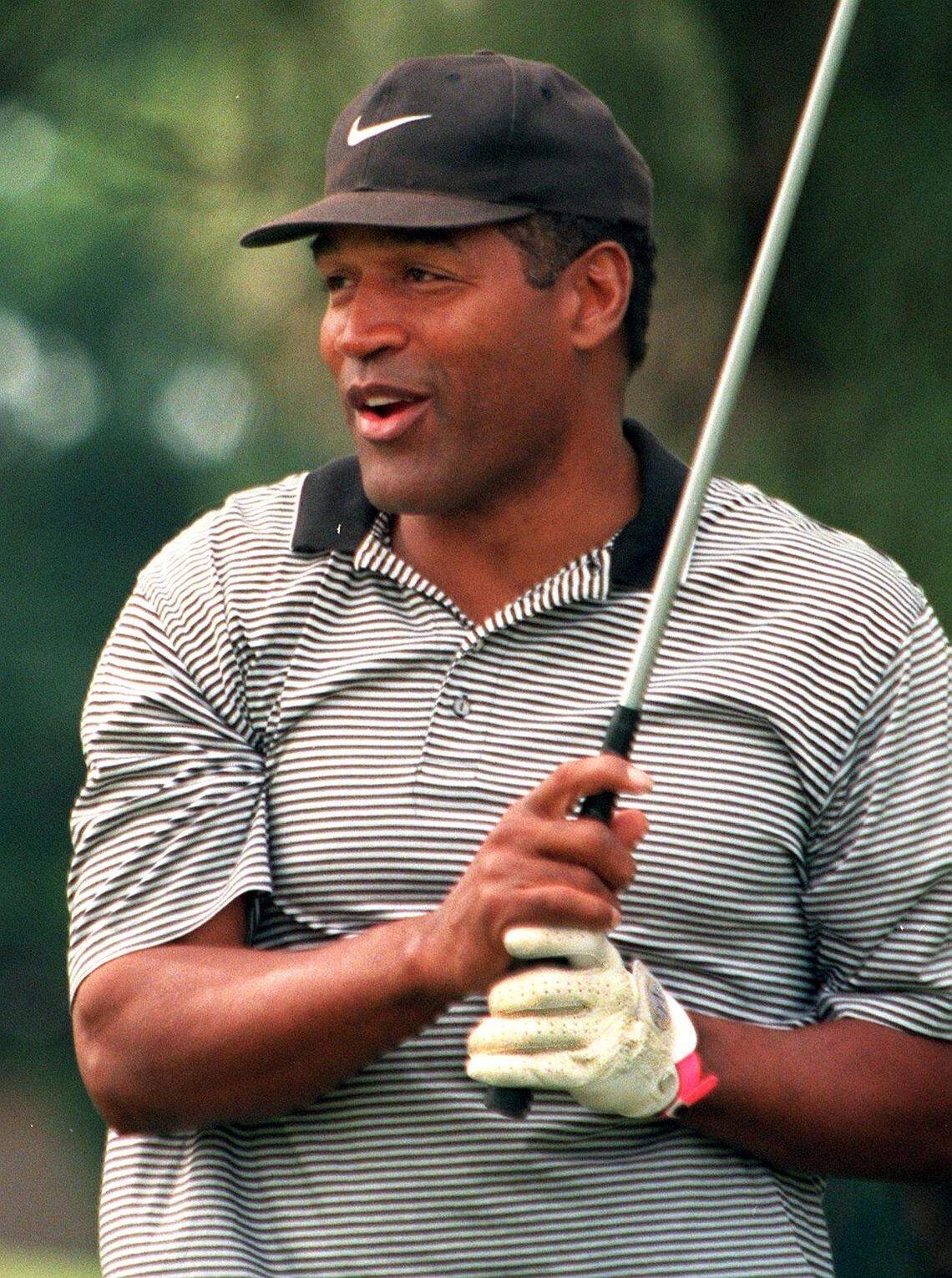 O.J. Simpson plays in golf in 1998 in Miami.