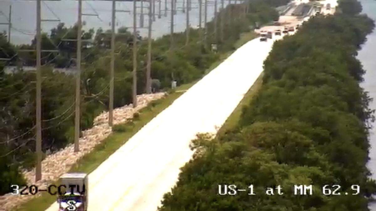 Traffic alternates lanes on U.S. 1 near Long Key State Park Friday, Oct. 1, 2021, following a multiple-vehicle crash.