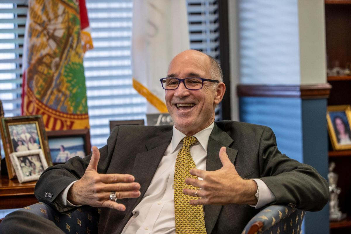FIU Interim President Kenneth Jessell talks to Miami Herald reporter Jimena Tavel in his office at the FIU Modesto Maidique Campus in Miami on Thursday, March 10, 2022.