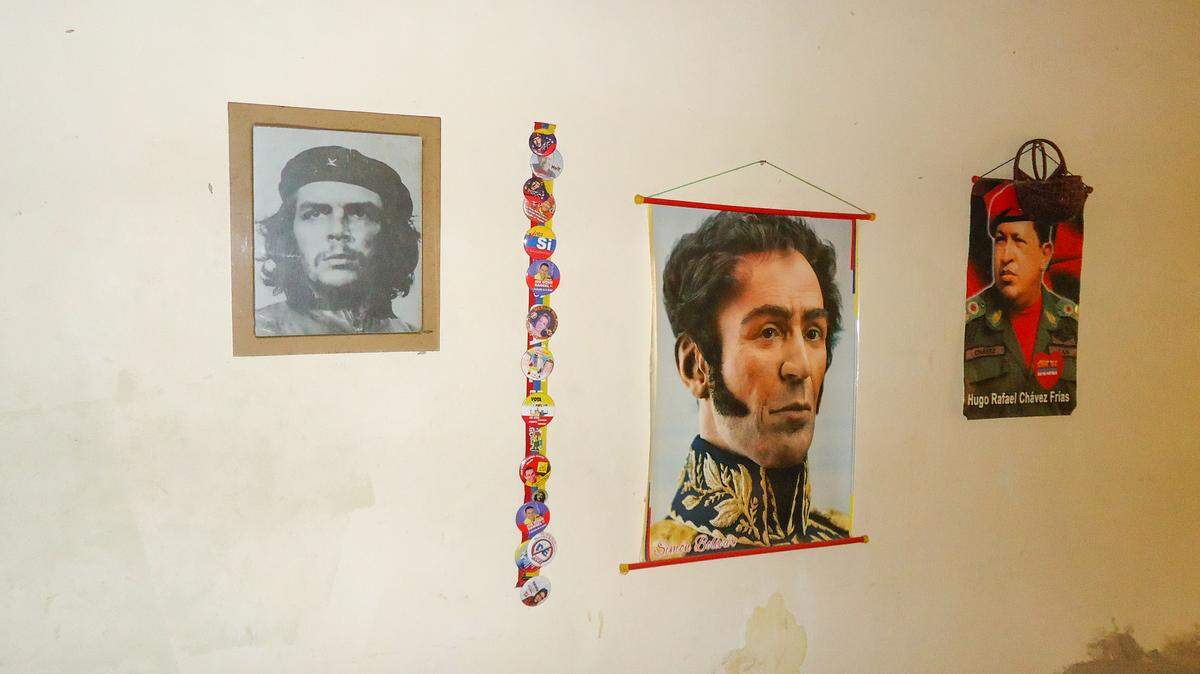 Inside the house of one of the beneficiaries of Venezuela’s subsidized food program, adorned with pictures of Hugo Chavez, Simon Bolivar and Ernest “Che” Guevara.