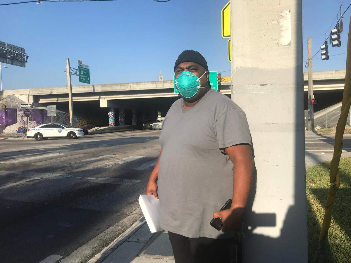 José Alcantra, an out-of-work Uber driver, was one of the first people to pick up a paper unemployment form at the Edison Center library in Miami on Wednesday, April 8, 2020. Miami-Dade is using its library system to hand out printed forms while Florida’s unemployment website remains overwhelmed.