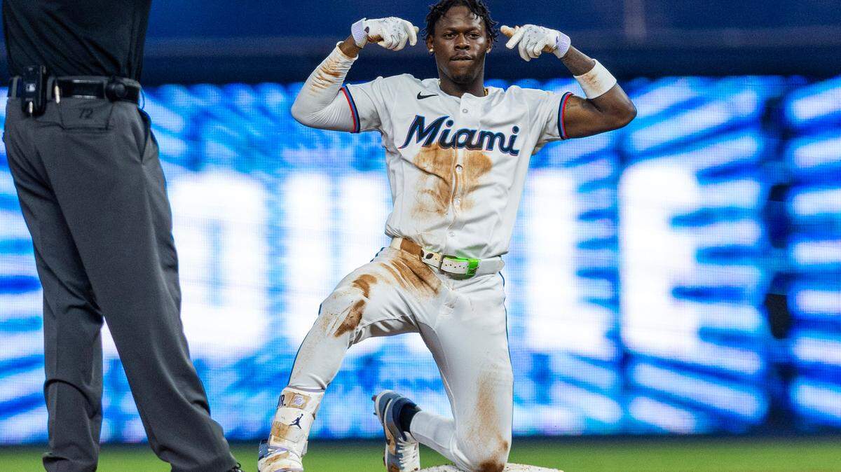 Miami Marlins batter Jazz Chisholm Jr. reacts to driving in to runs during the second inning of an MLB game against the Baltimore Orioles at loanDepot Park on Tuesday, July 23, 2024, in Miami, Fla.