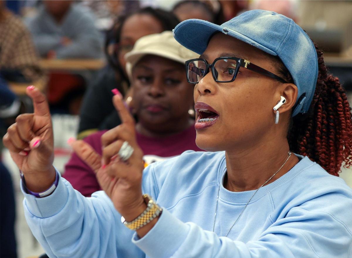 Narnike Pierre-Grant, center, shares her remarks during the break-out session as Broward County Public Schools held the first of three town halls to discuss with the community the possibility of closing schools in 2025 due to under-enrollment. The town hall took place at Fort Lauderdale High School on Thursday, February 8th, 2024.