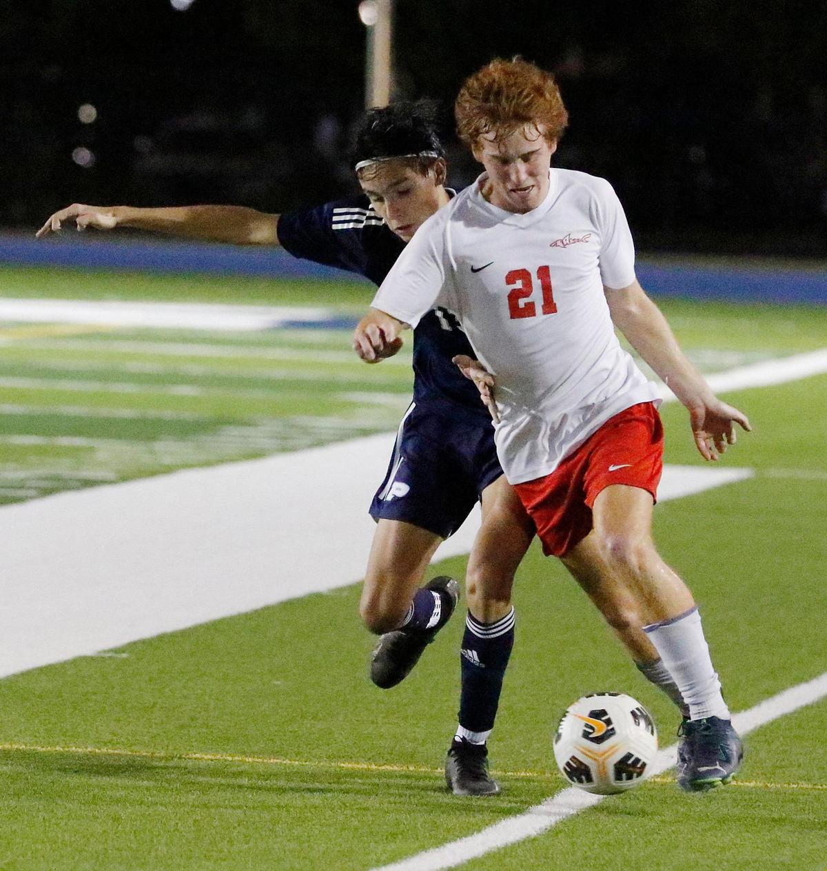 MAST Academy Diego Olavarria (21) takes control of the ball during GMAC Boys Soccer Championship game against Palmetto on Friday, January 12, 2024 at Traz Powell Stadium in Miami.
