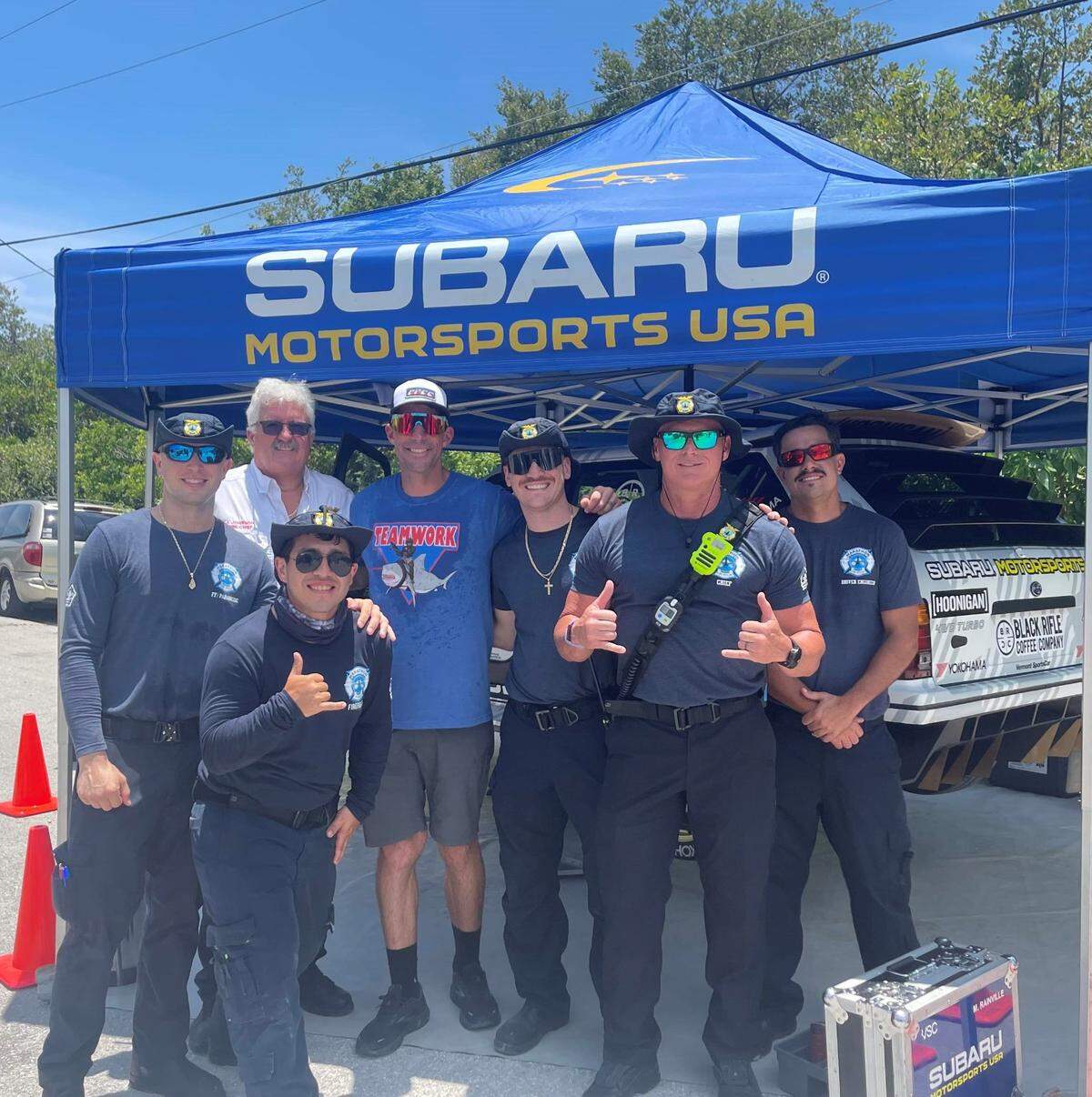 Travis Pastrana, third from left in the back row, poses with Marathon Fire Rescue staff including Chief John Johnson and Deputy Chief Cameron Bucek, who were on hand for the July 11, 2022, stunt jump at Boot Key Bridge.