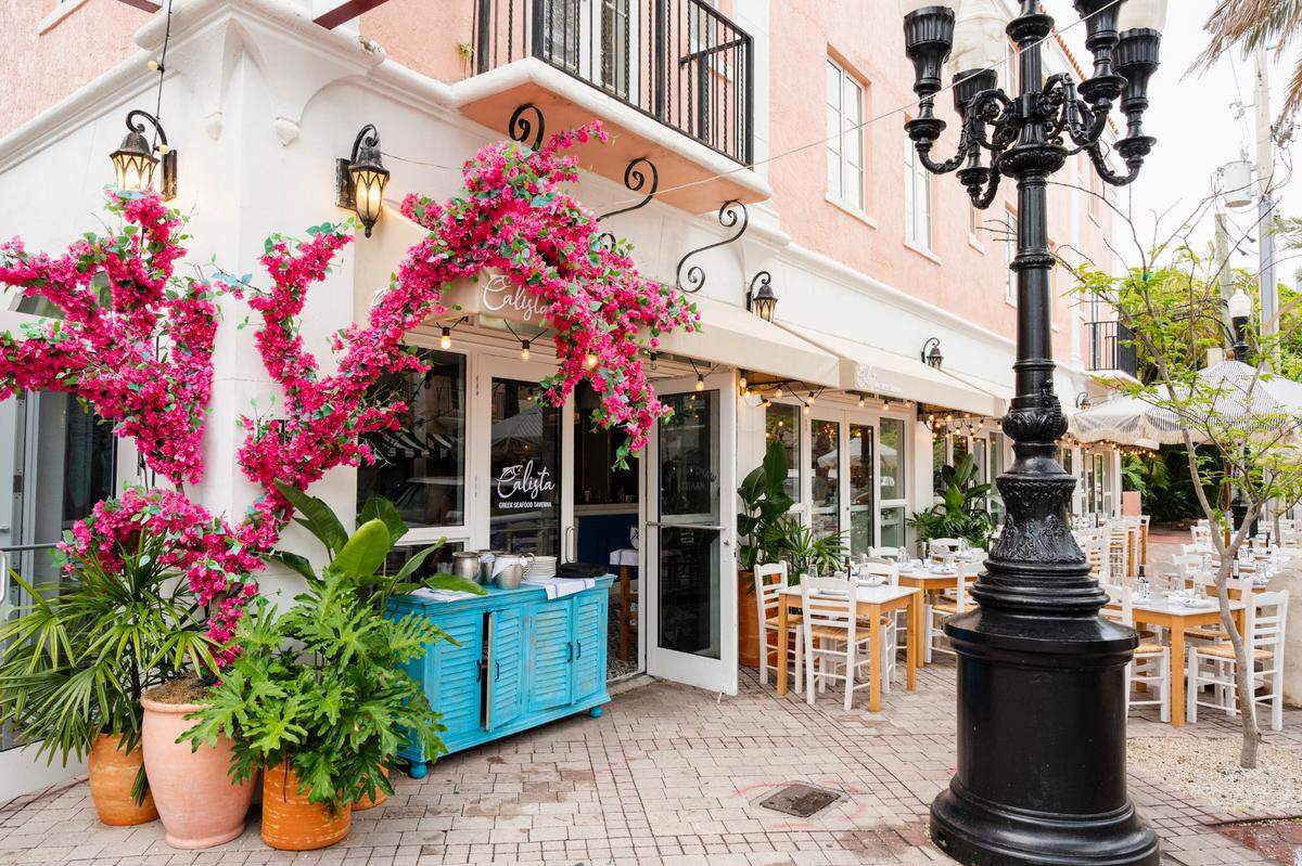 The entrance and outdoor patio at Calista Greek Seafood Taverna on Española Way in Miami Beach.