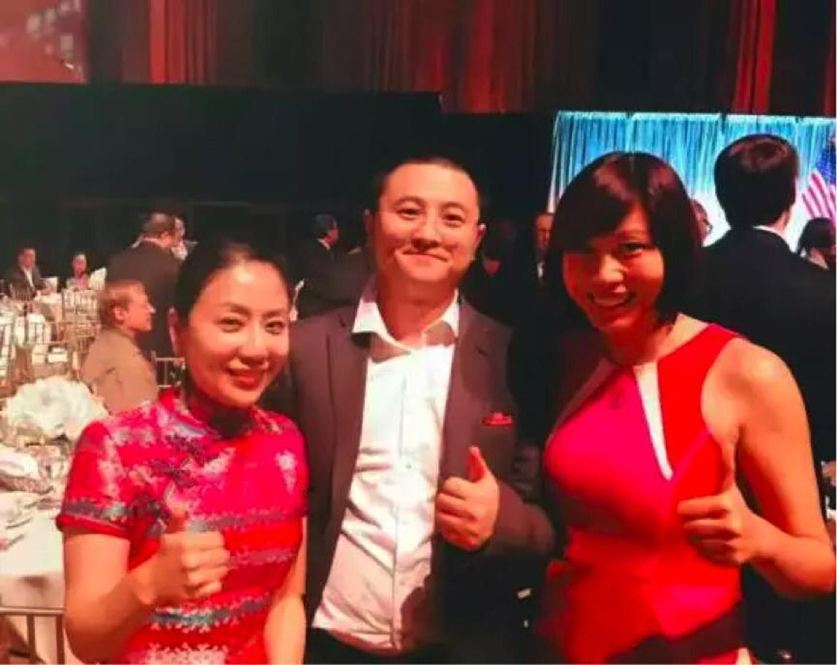 Ryan Xu took a photograph with Li Jing, right, who was said to have helped organize guests for the Asian GOP at President Trump’s 2017 fundraiser. She said she could not recall making a $25,000 contribution to Trump Victory.