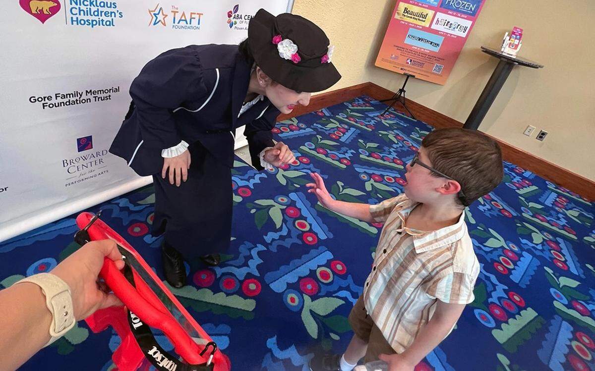 Benjamin Kores meets a cast member of ‘Mary Poppins’ at the Broward Center for the Performing Arts in July 2025.