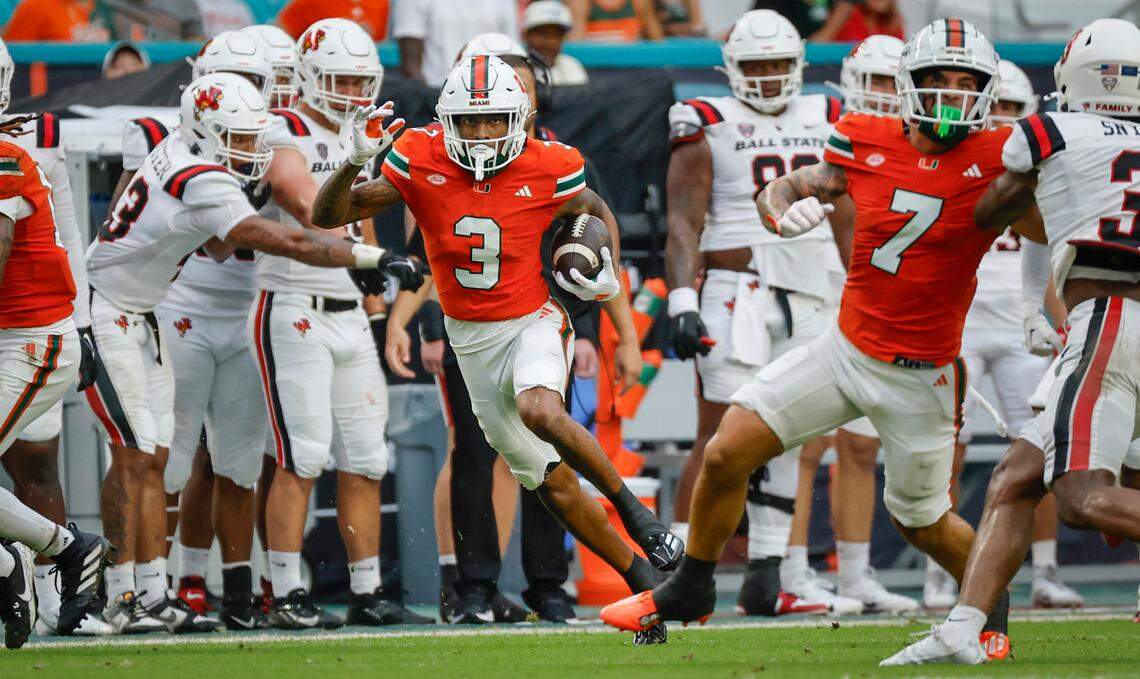 Miami Hurricanes wide receiver Jacolby George (3) on a reception in the first half of an NCAA football game against the Ball State Cardinals at Hard Rock Stadium in Miami Gardens, Florida on Saturday, September 14, 2024.