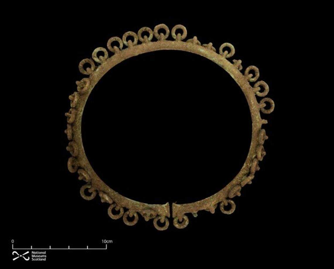 The complete ring has 37 smaller circles around the exterior and appears to never have been used or worn.