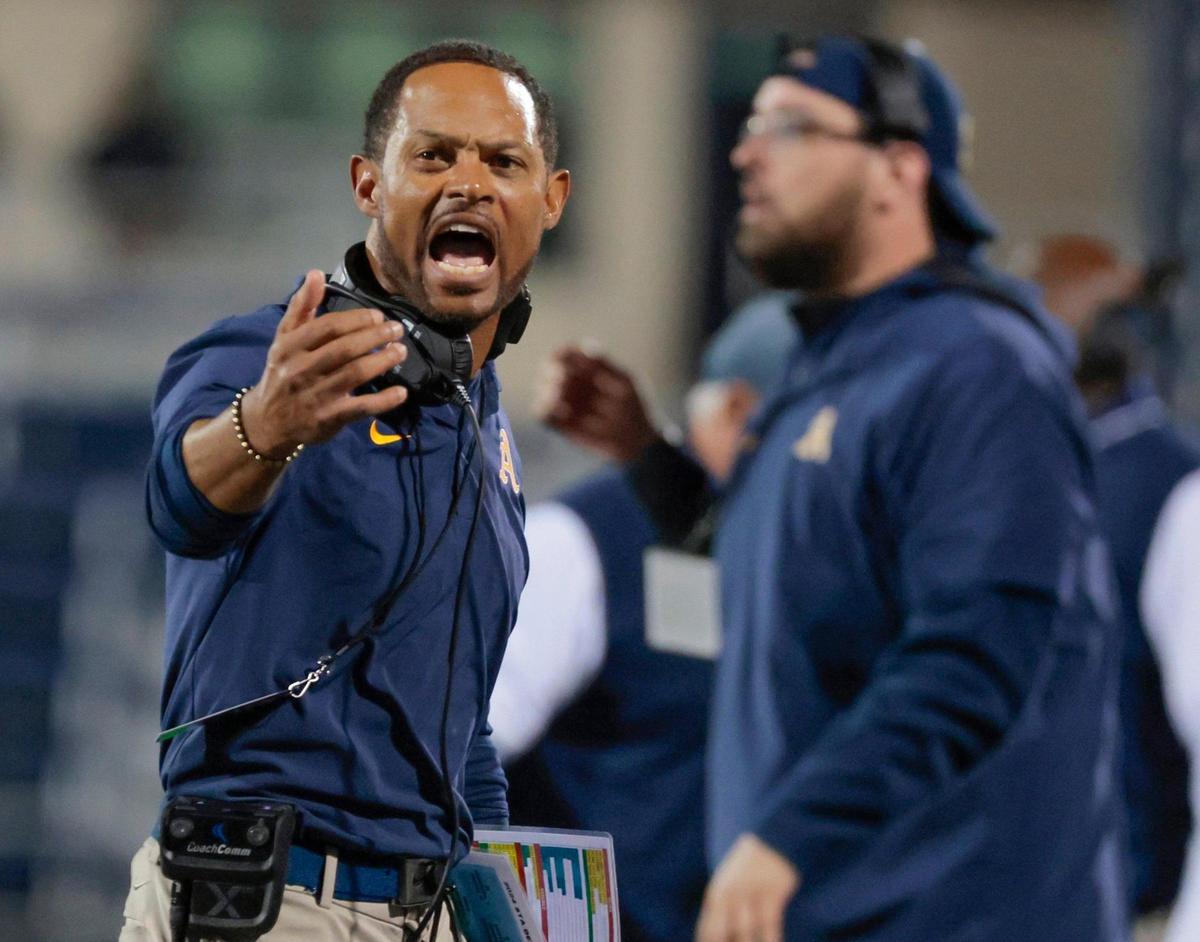 St. Thomas Aquinas head coach Roger Harriott directs his players from the sidelines during the game against Lakeland Dreadnaughts in the first half during the Class 5A state championship game at Pitbull Stadium on the campus of Florida International University in Miami, Florida, on Thursday, December 12, 2024.