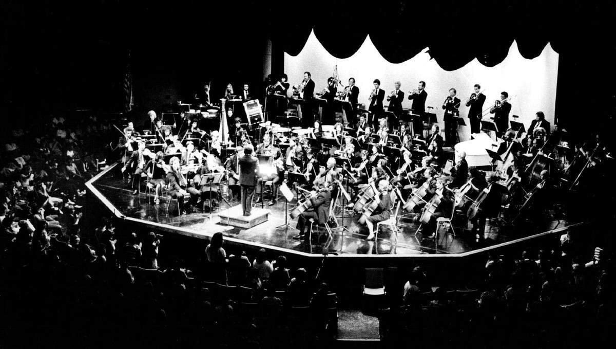 In 1985, an orchestra performs on stage for kids at the Sunrise Musical Theatre.
