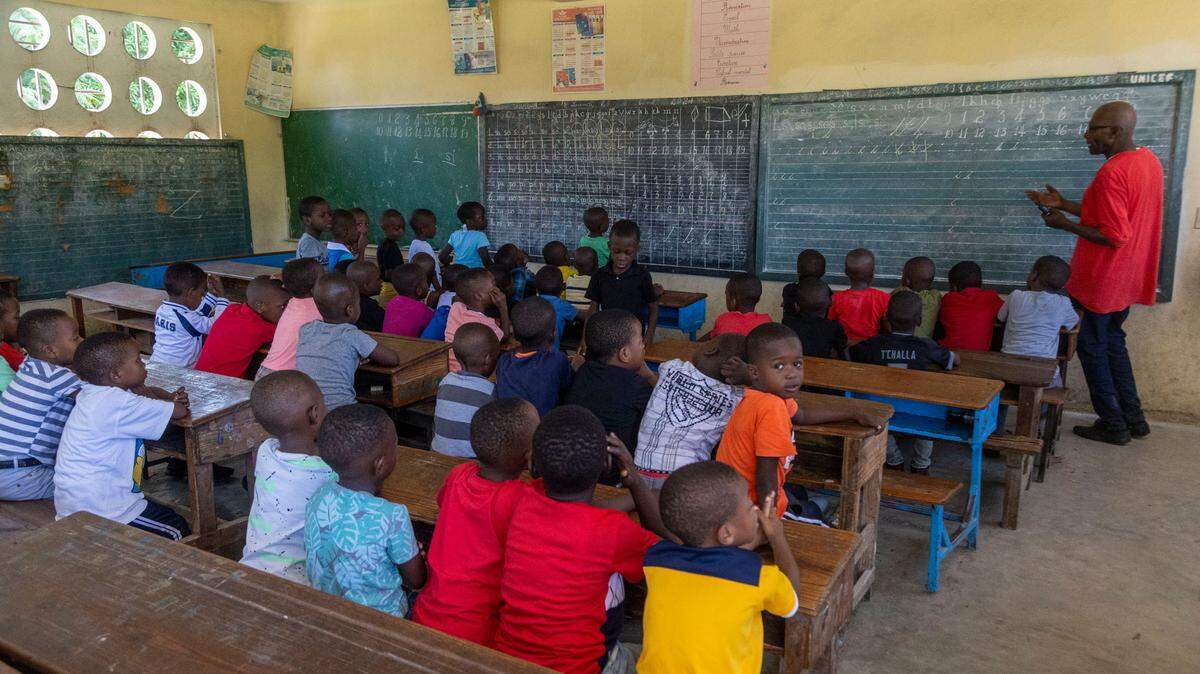 First graders attend class during summer classes at École National Louis Borno de Léogâne in Léogâne, Haiti. Many of the students were displaced by the gang violence in Port-au-Prince and neighboring Gressier.