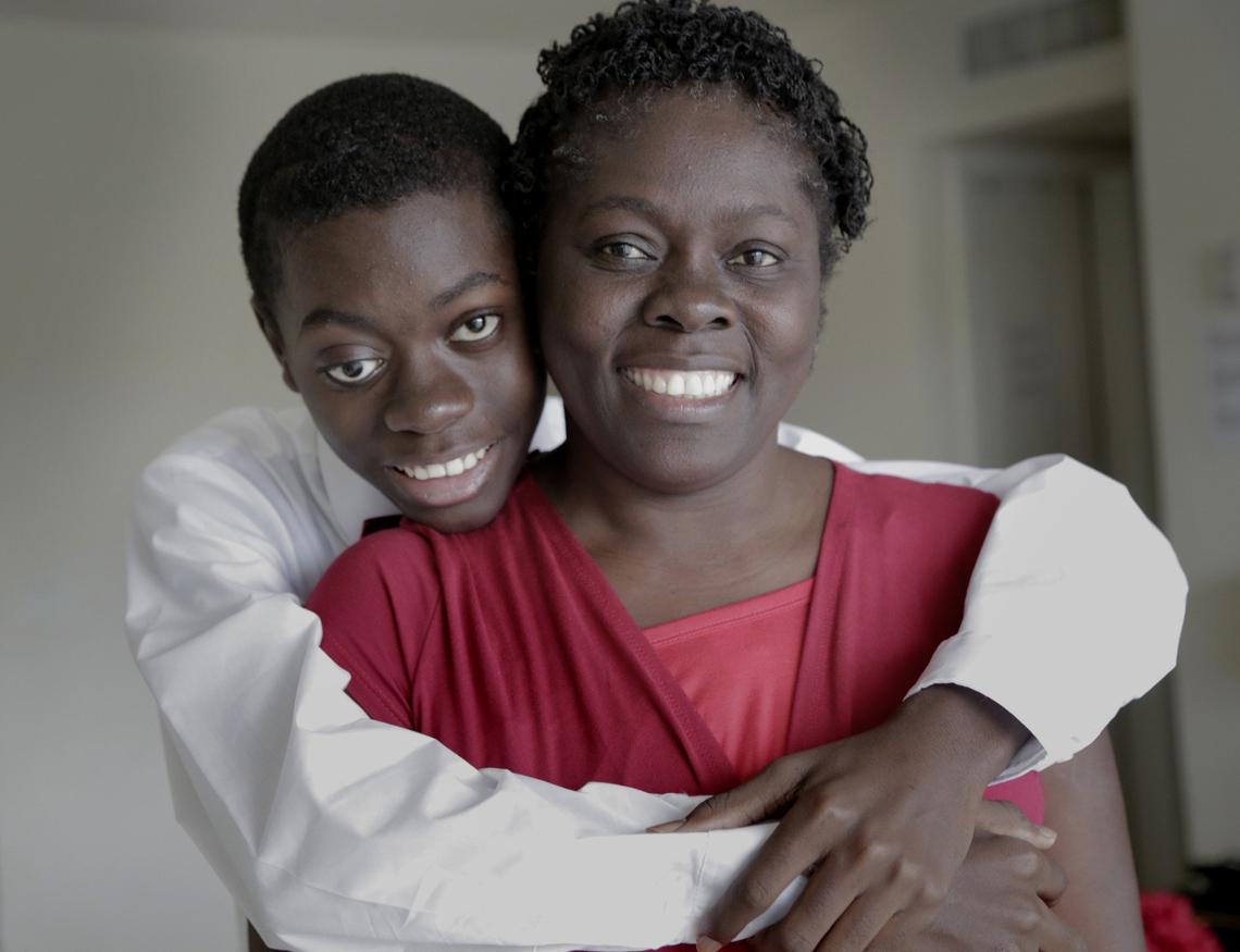 Djonsly Alcin, 14, who is from Haiti, has optic pathway glioma, a slow-growing brain tumor. The refusal by his mother, Marie Belatrice Louis-Jean, to give up helped him find treatment in South Florida.