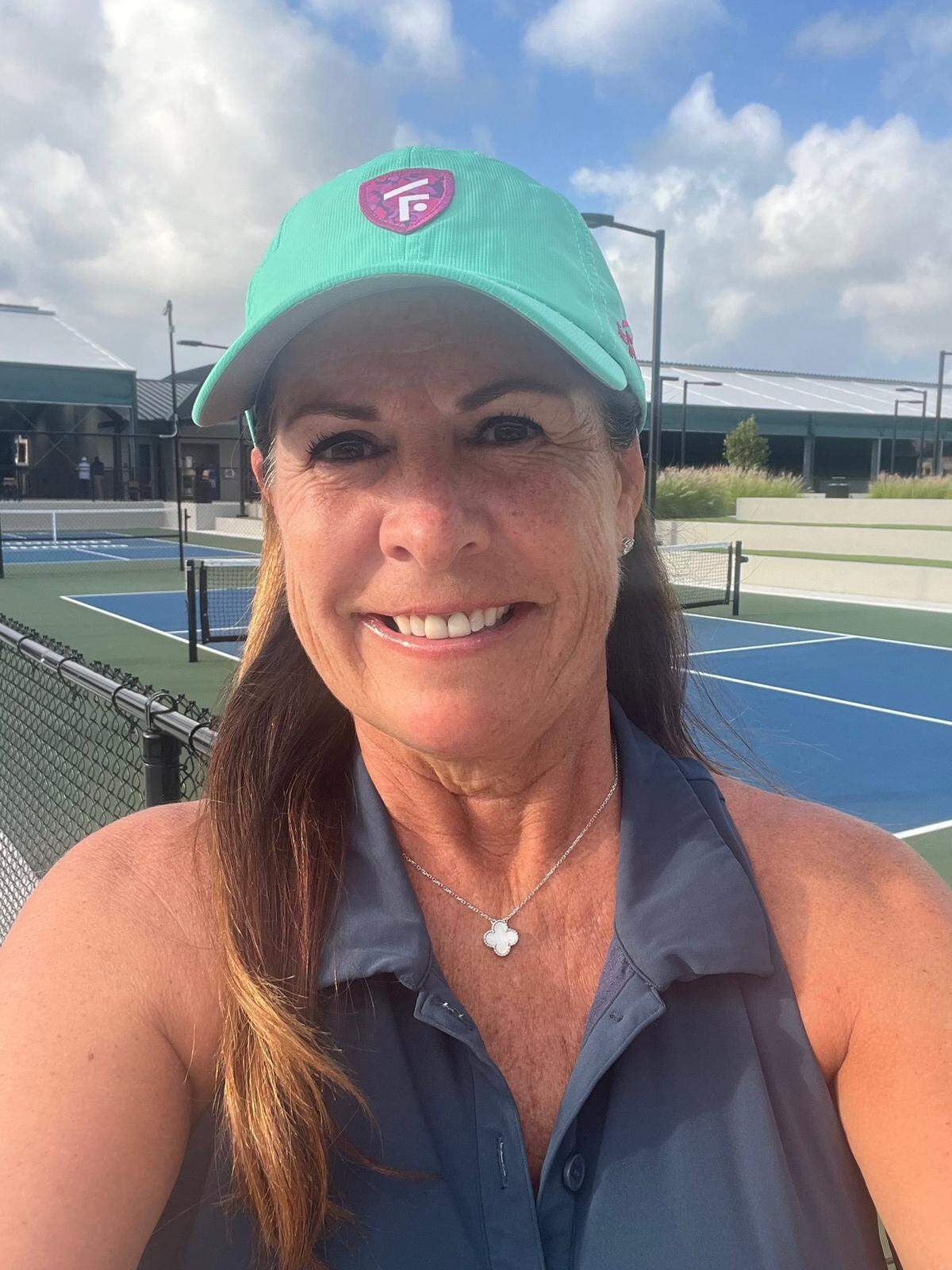 Kristin Howell with The Fort pickleball facility in Fort Lauderdale behind her.