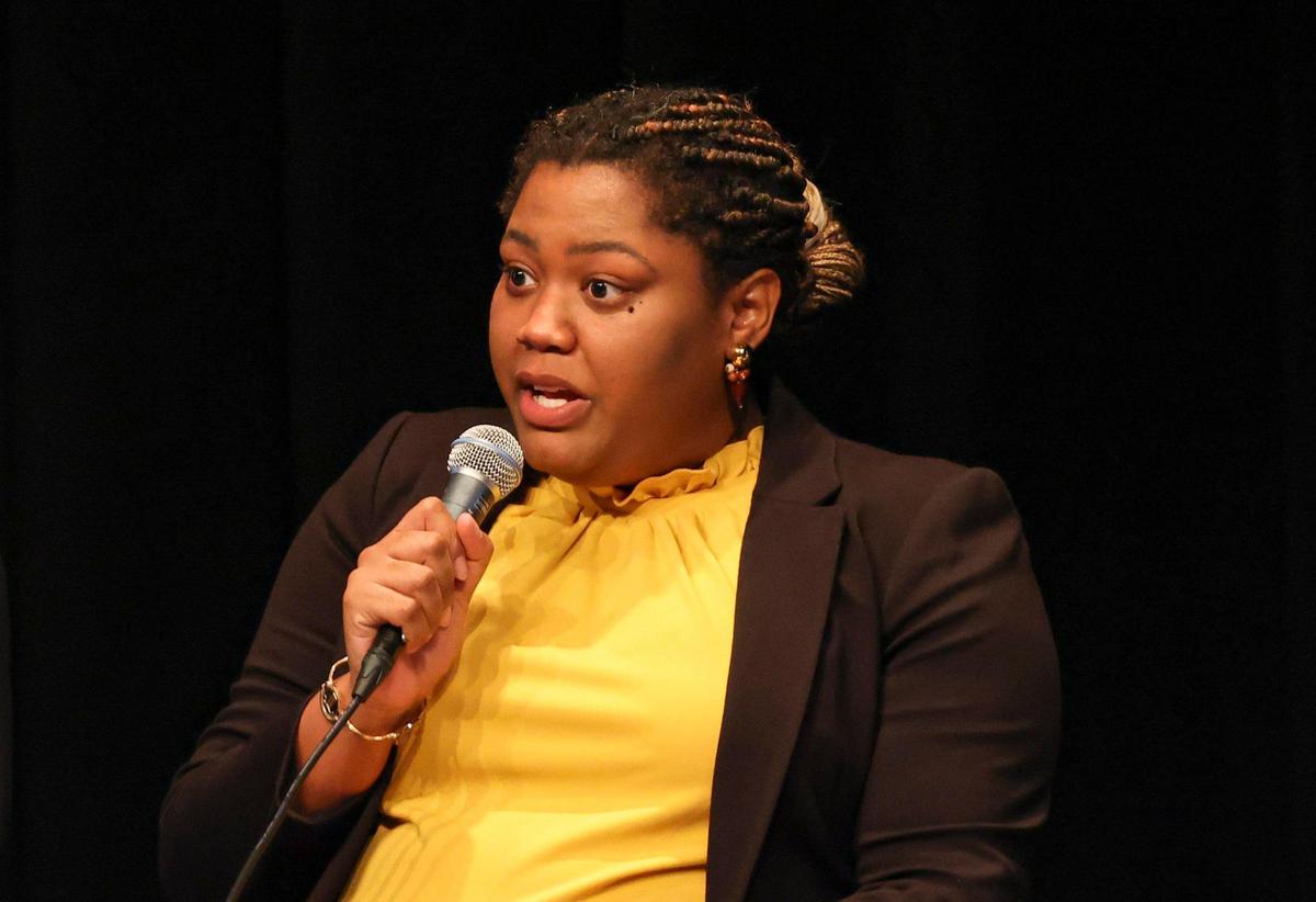Krystina François, co-director for Communities United for Status and Protection, speaks during a panel about immigration on Thursday, Feb. 23, 2023, at Miami Dade College Wolfson Campus Auditorium.