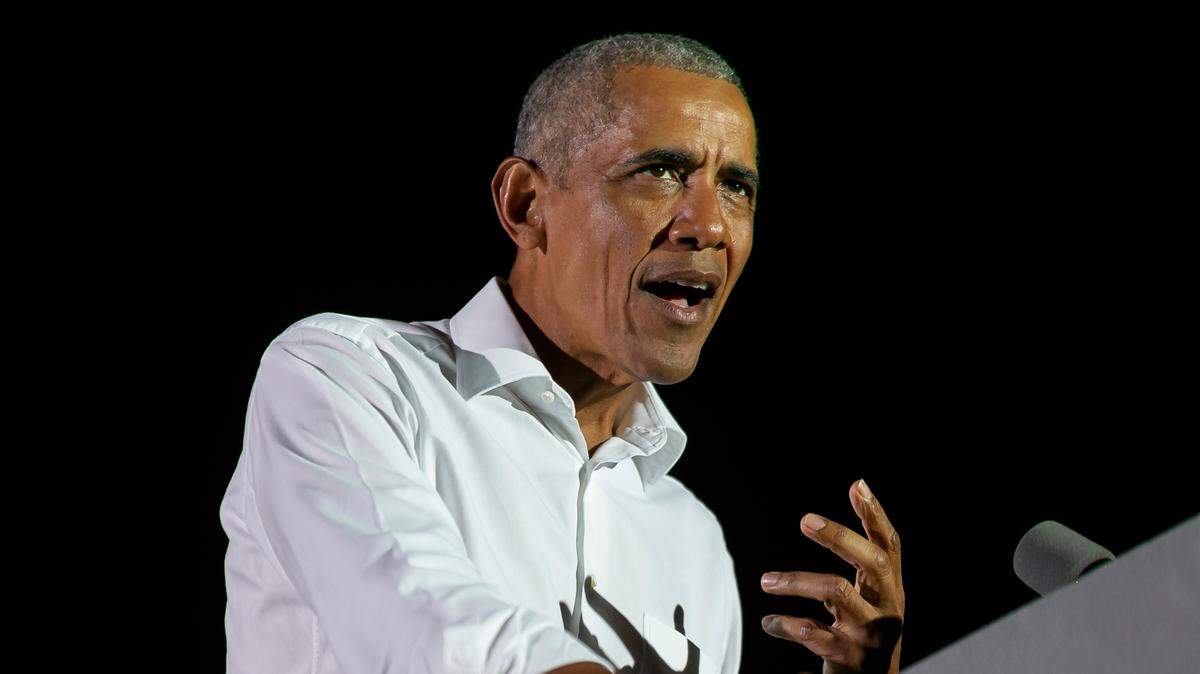 Former President Barack Obama speaks during a drive-in rally near Florida International University in Miami, Florida on Monday, November 2, 2020.