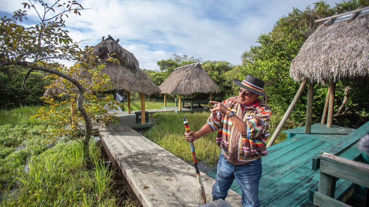Miccosukee Elder Michael Frank visits his family’s tree island where he spent part of his youth.