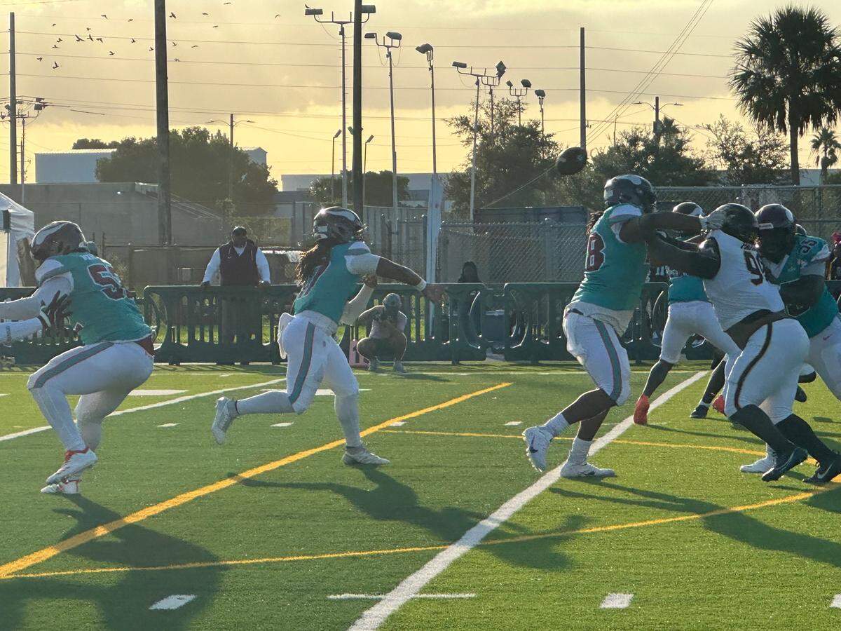 Miami Norland quarterback Ennio Yapoor fires a ball downfield during Monday’s game against Plantation American Heritage at Traz Powell Stadium.