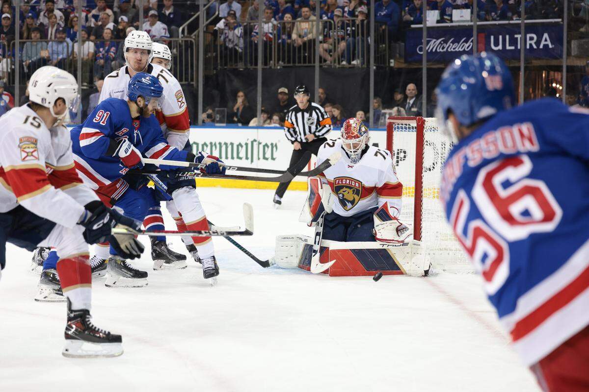 May 24, 2024; New York, New York, USA; Florida Panthers goaltender Sergei Bobrovsky (72) makes a save against New York Rangers defenseman Erik Gustafsson (56) during the second period in game two of the Eastern Conference Final of the 2024 Stanley Cup Playoffs at Madison Square Garden. Mandatory Credit: Vincent Carchietta-USA TODAY Sports