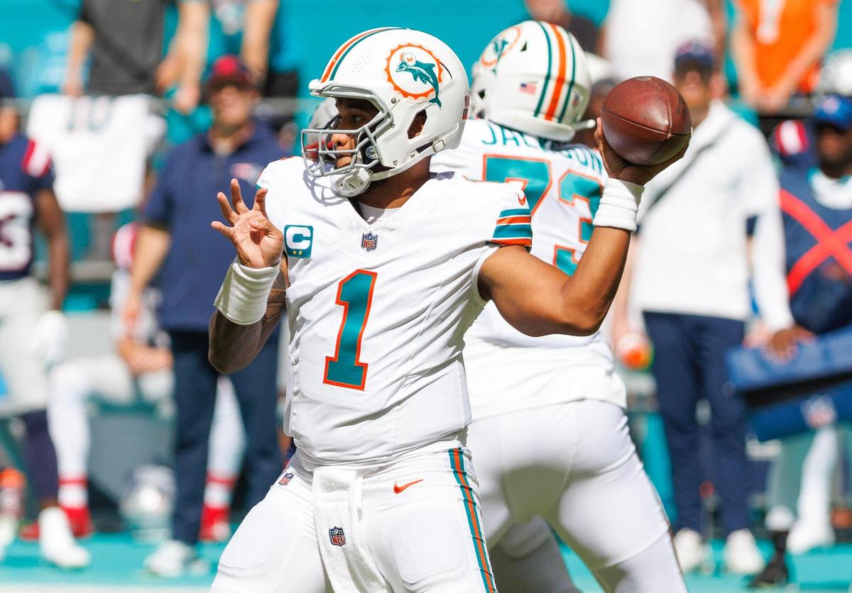 Miami Dolphins quarterback Tua Tagovailoa (1) sets up to pass during first quarter of an NFL football game against the New England Patriots at Hard Rock Stadium on Sunday, Oct. 29, 2023 in Miami Gardens, Fl.