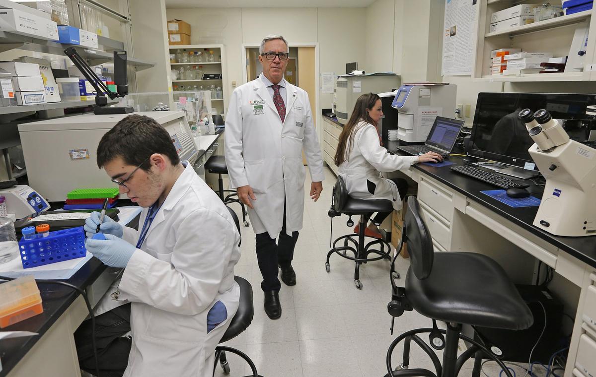 At center, Dr. Camillo Ricordi from University of Miami’s medical school is working on islet cell transplantation. Diabetes patients who have had the cell transplants are now living without insulin.