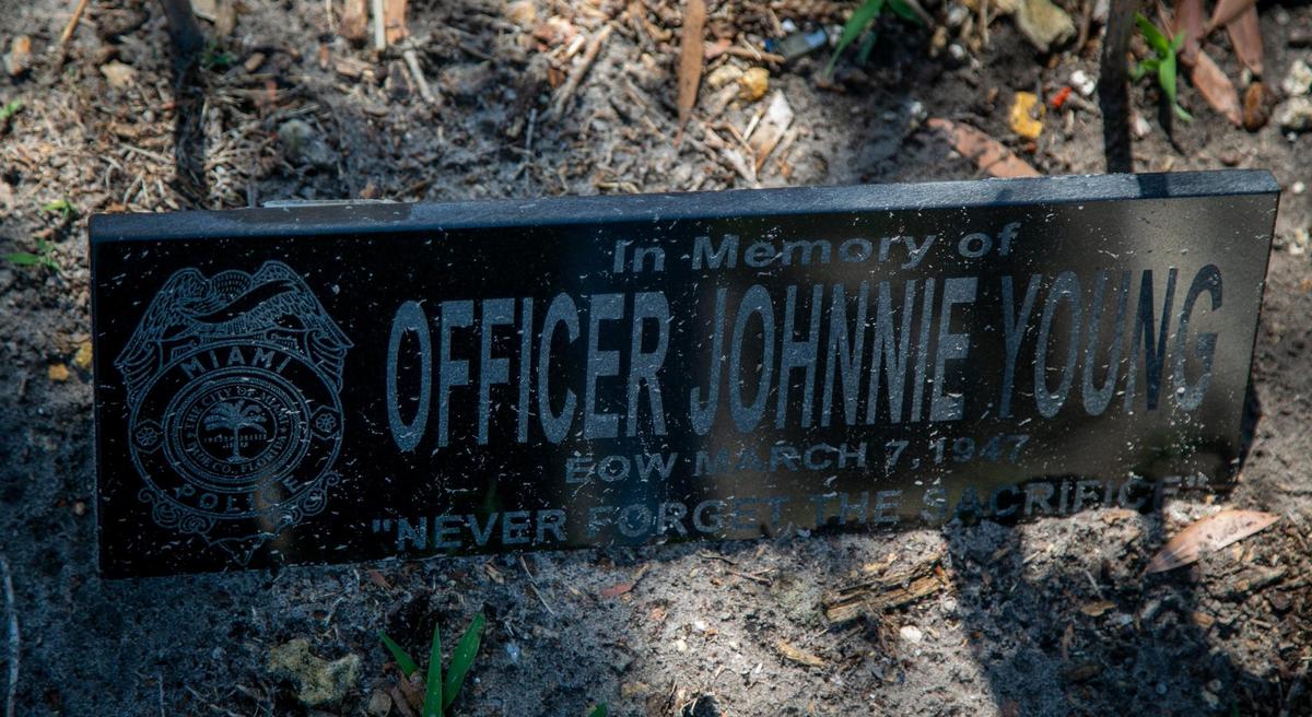 Miami, Florida, May 7 2021 - A marker identifying Officer Johnny Young in a makeshift memorial at Evergreen Memorial Park in Allapatah. Officer Young’s grave is believed to be in Evergreen Memorial Park but has not been located.