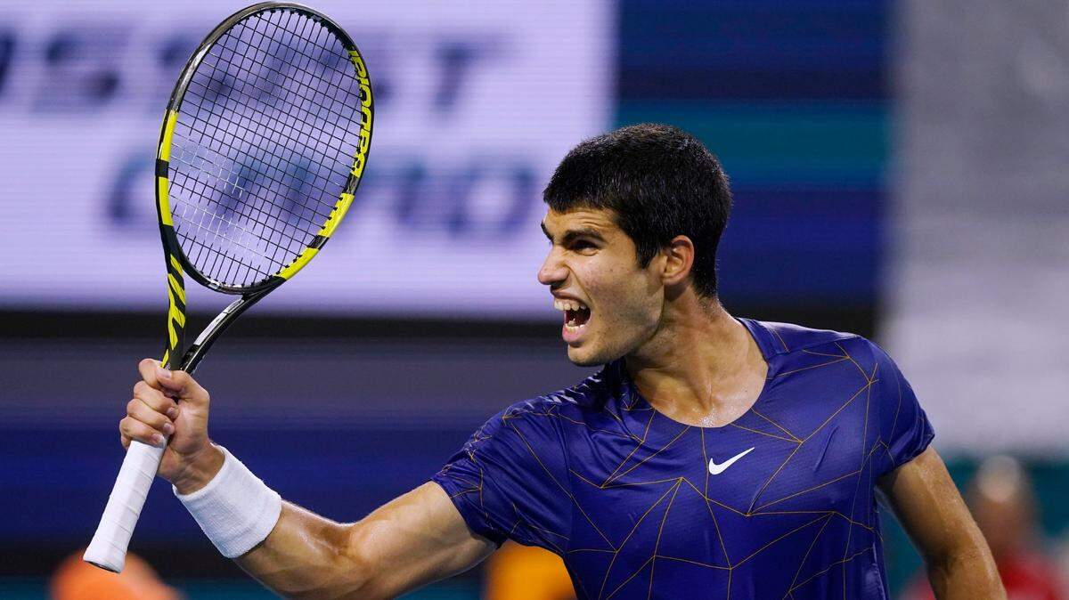 Carlos Alcaraz, of Spain reacts, to scoring a point in the first set against Hubert Hurkacz, of Poland, during the semifinals of the Miami Open tennis tournament Friday, April 1, 2022, in Miami Gardens, Fla. (AP Photo/Marta Lavandier)