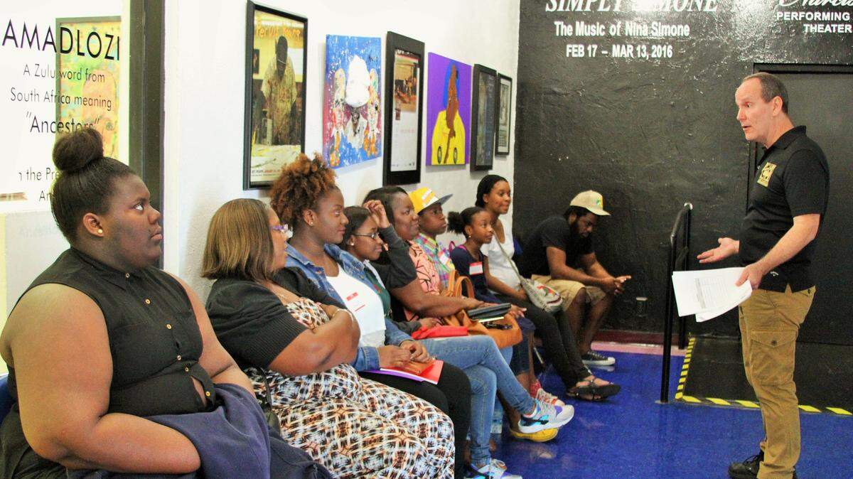 Earl Maulding, the artistic director of the Young Talent, Big Dreams competition, tells contestants and their family members some guidelines before they perform.