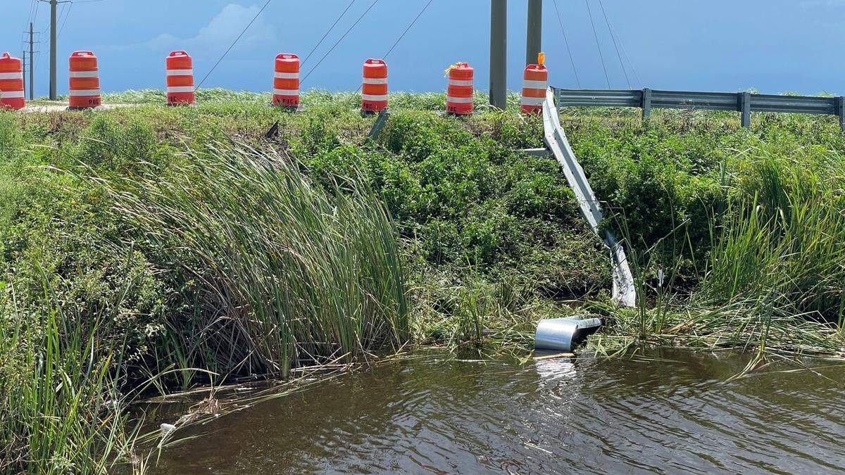 An SUV crash into a canal near Belle Glade, Florida, on Monday, Aug. 5, 2024, killed nine people and injured one. The SUV crashed through a metal guardrail along Hatton Highway near Conners Highway as it plunged into the waters, which were more than 6 feet deep.