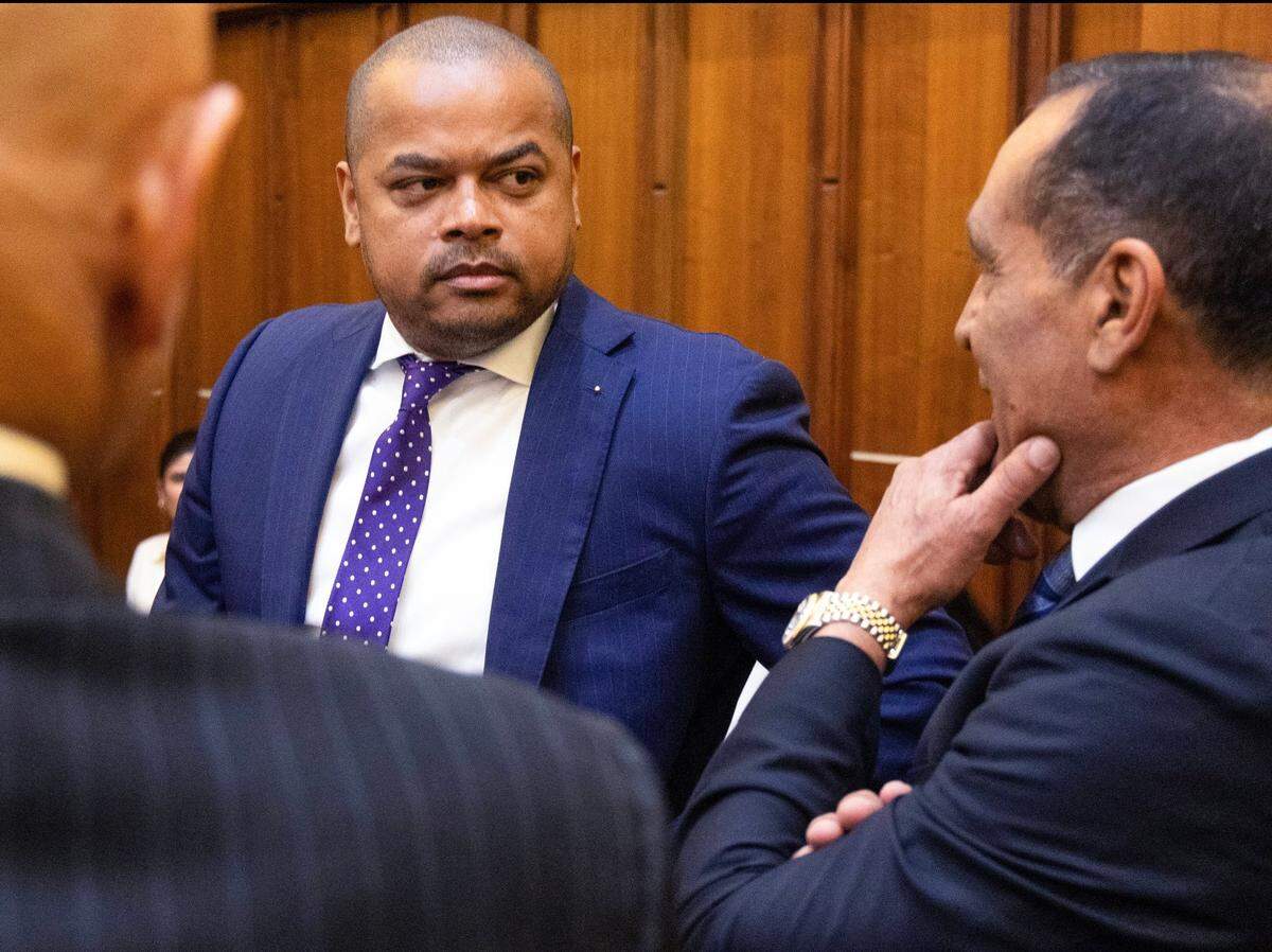 Suspended Miami-Dade Commissioner Joe Martinez, right, introduces Miami-Dade Commissioner Keon Hardemon, center, as he appears in court during jury selection of Martinez’s public corruption trial at the Richard E. Gerstein Justice Building on Thursday, April 11, 2024, in Miami, Florida.