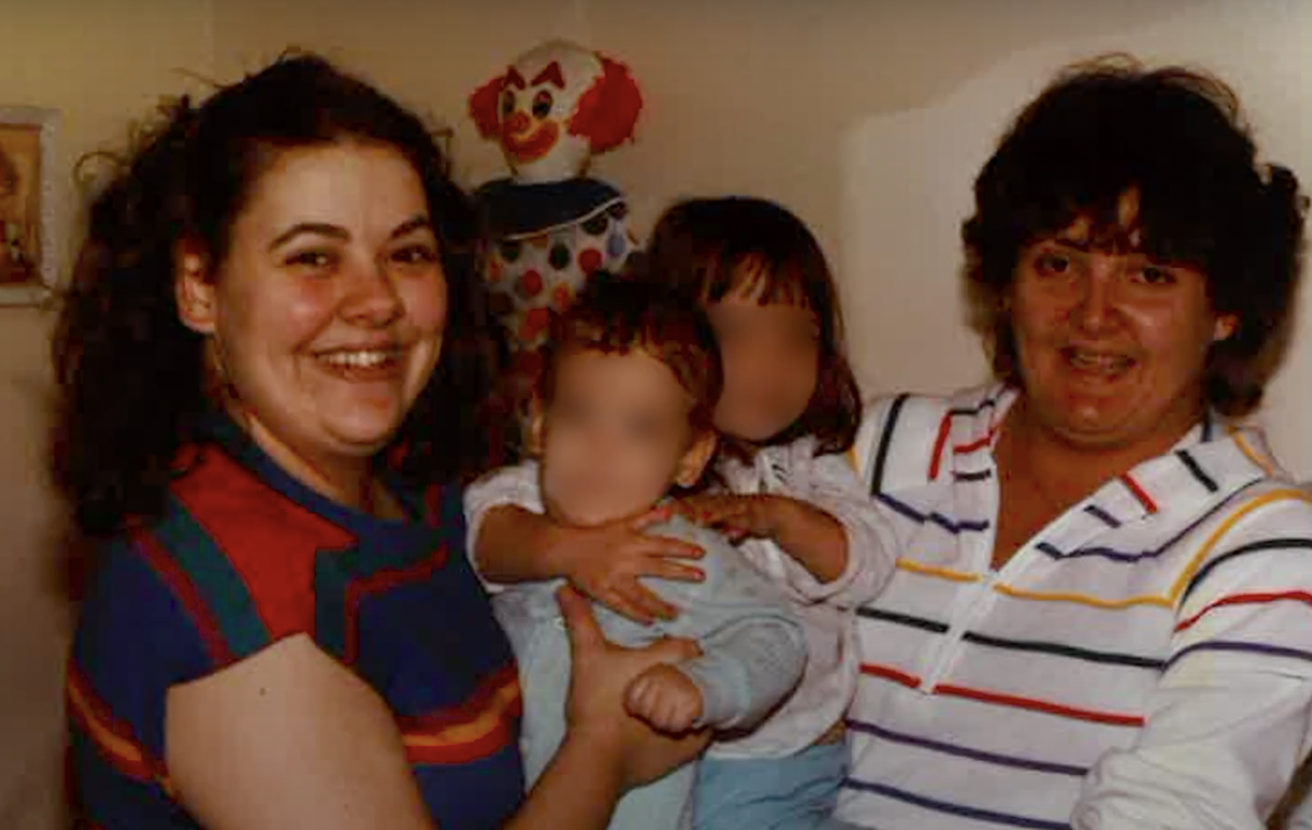 A screenshot from a video showing a photo of Eileen Truppner with sister Nancy Truppner.